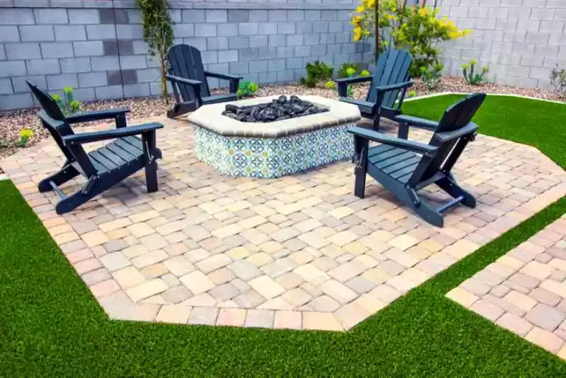 Paver patio with fire pit and seating in Newburgh, IN